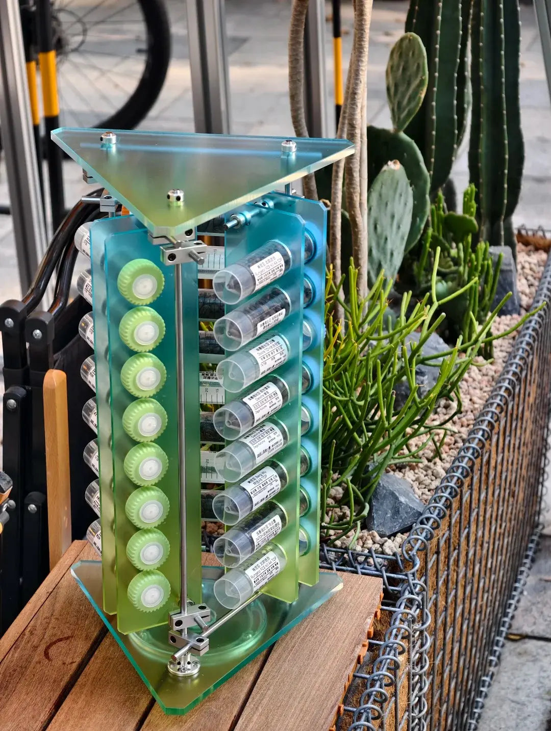 HushLume custom acrylic coffee bean display stand — chrome steel shafts and aluminum fittings, Mini and Pro sizes