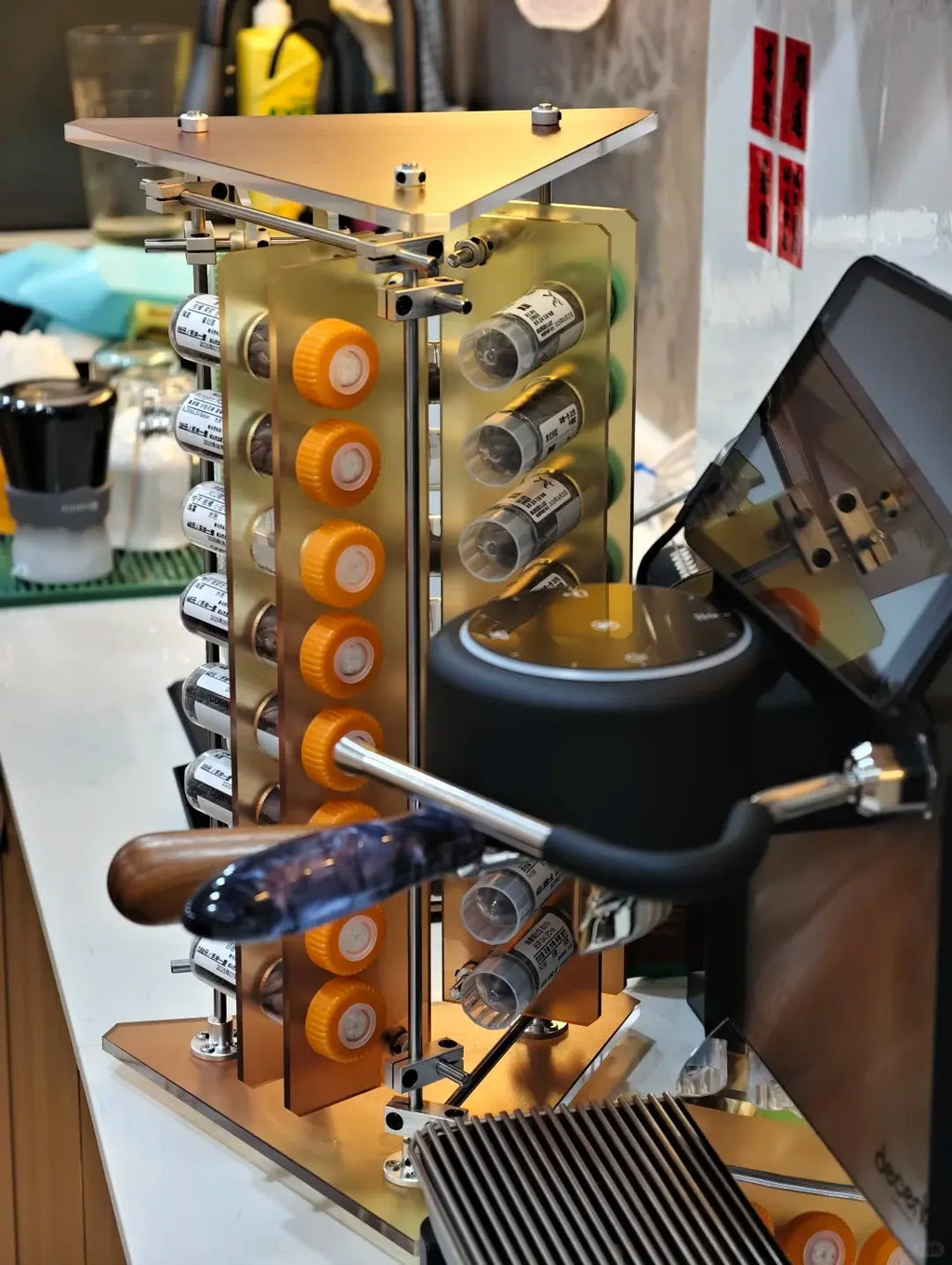 HushLume coffee bean display stand side view — rotating base and aluminum fittings