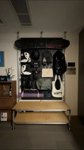 Custom modular aluminum-profile shelving unit with multiple storage levels.